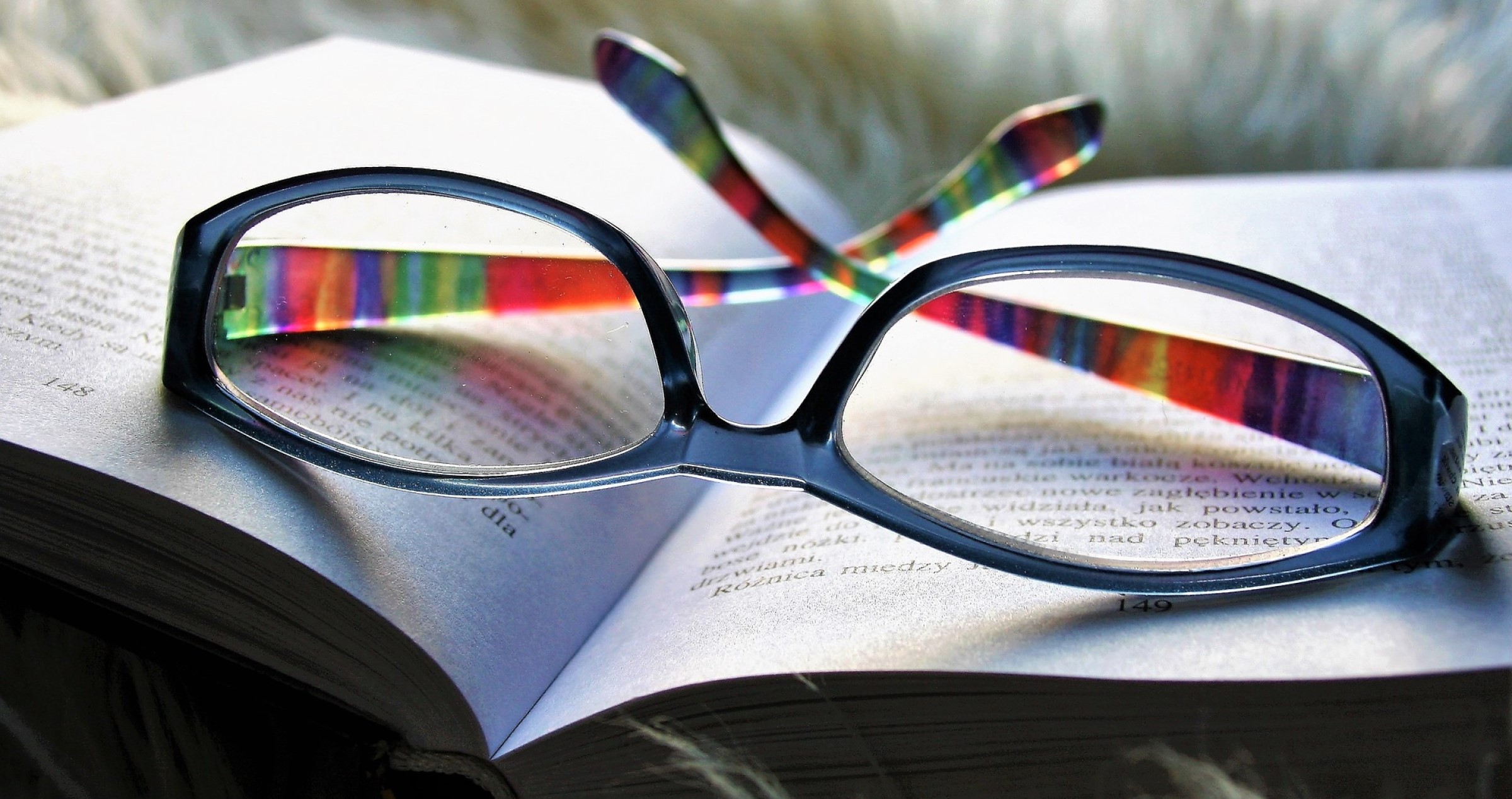 Glasses placed on an open book